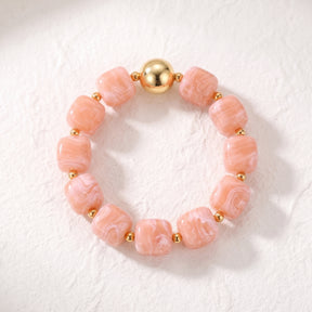 Koraalkleurige chunky armband